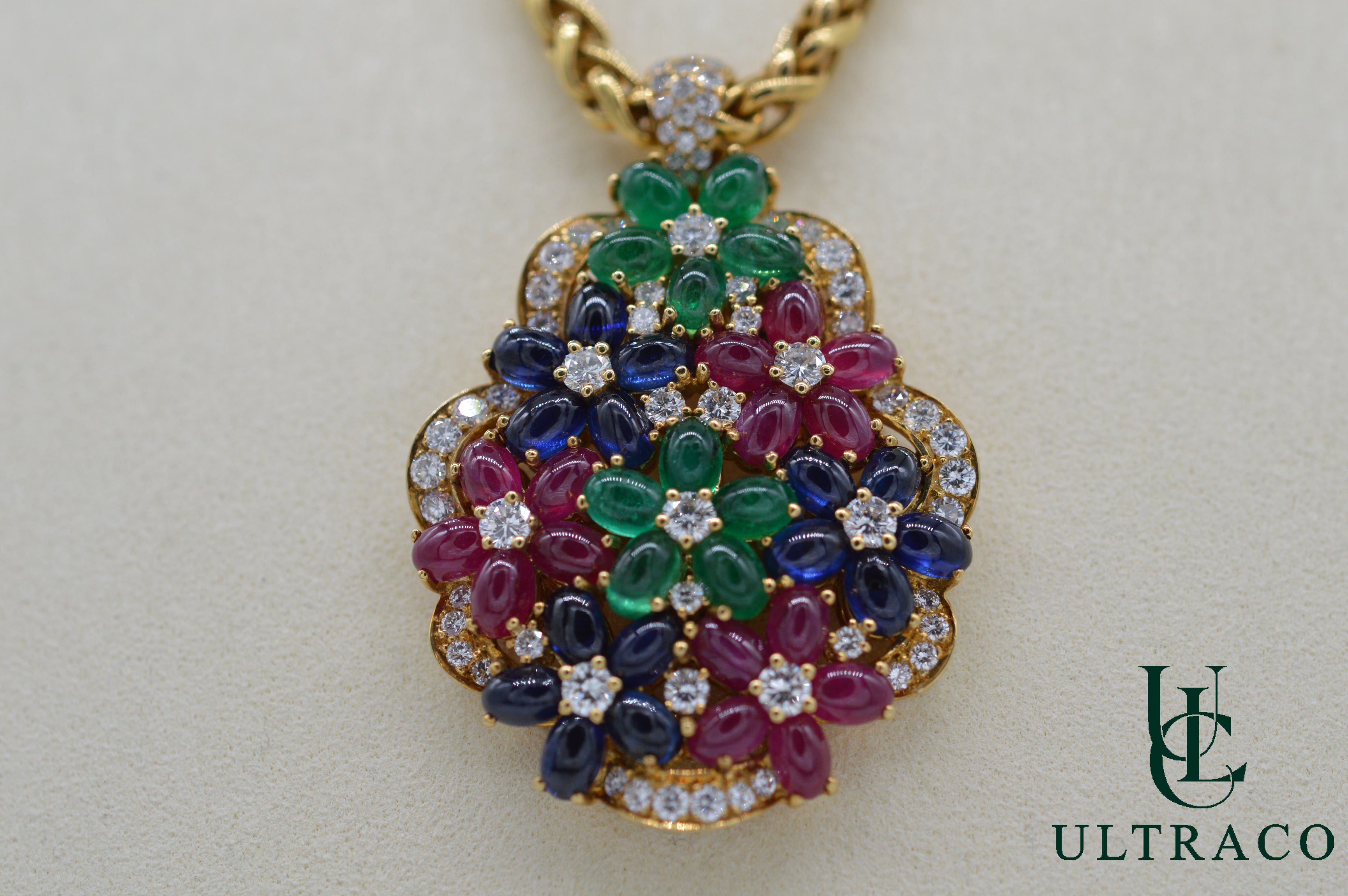 Pendentif avec diamants, émeraudes, rubis et saphirs cabochon en or jaune 18 carats