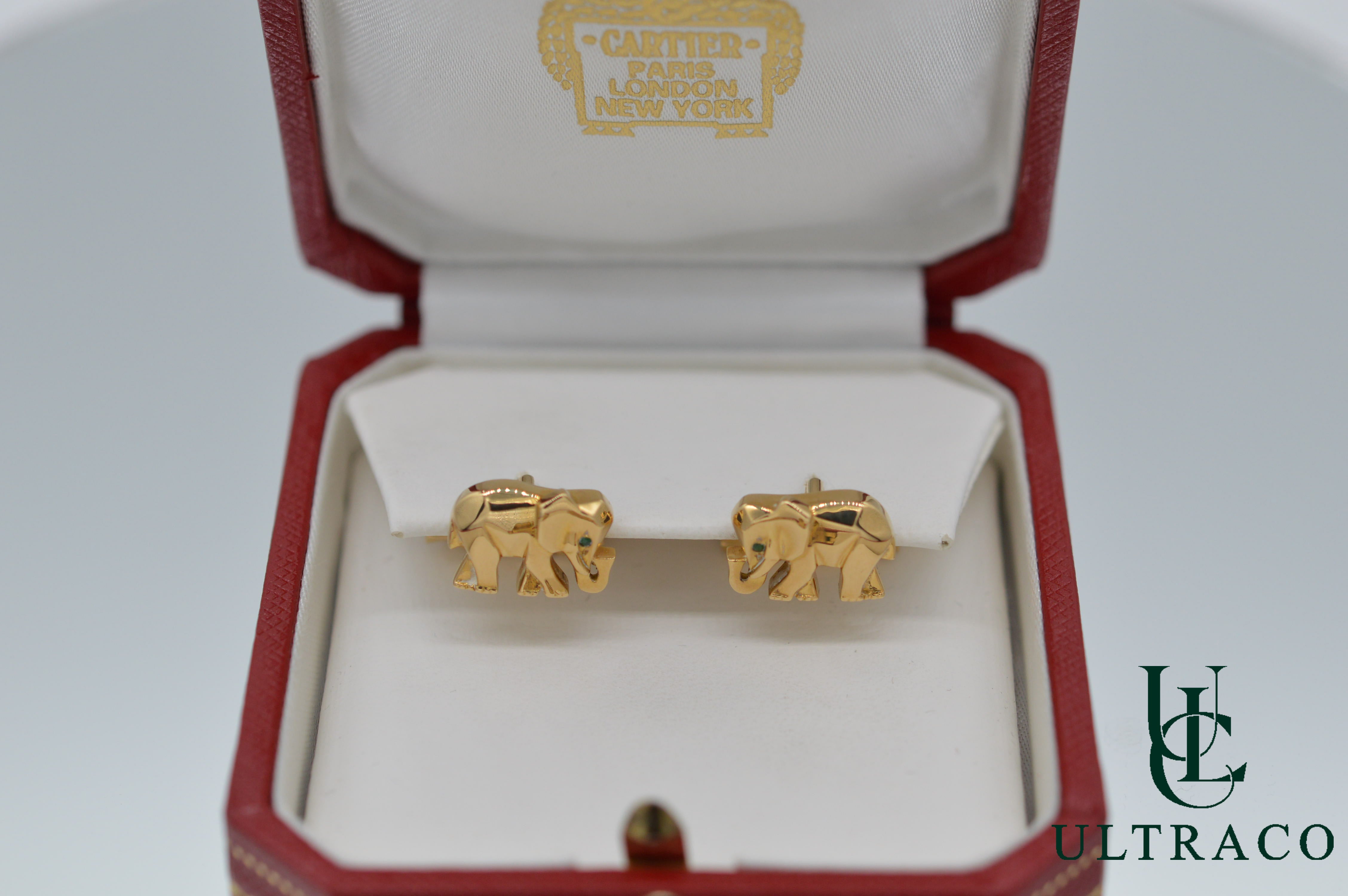 Boutons de manchette éléphant Cartier aux yeux émeraude en or jaune 18 carats