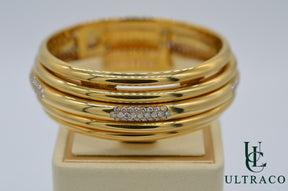 Piaget Possession Spinning Bangle With Diamonds & 18K Yellow Gold